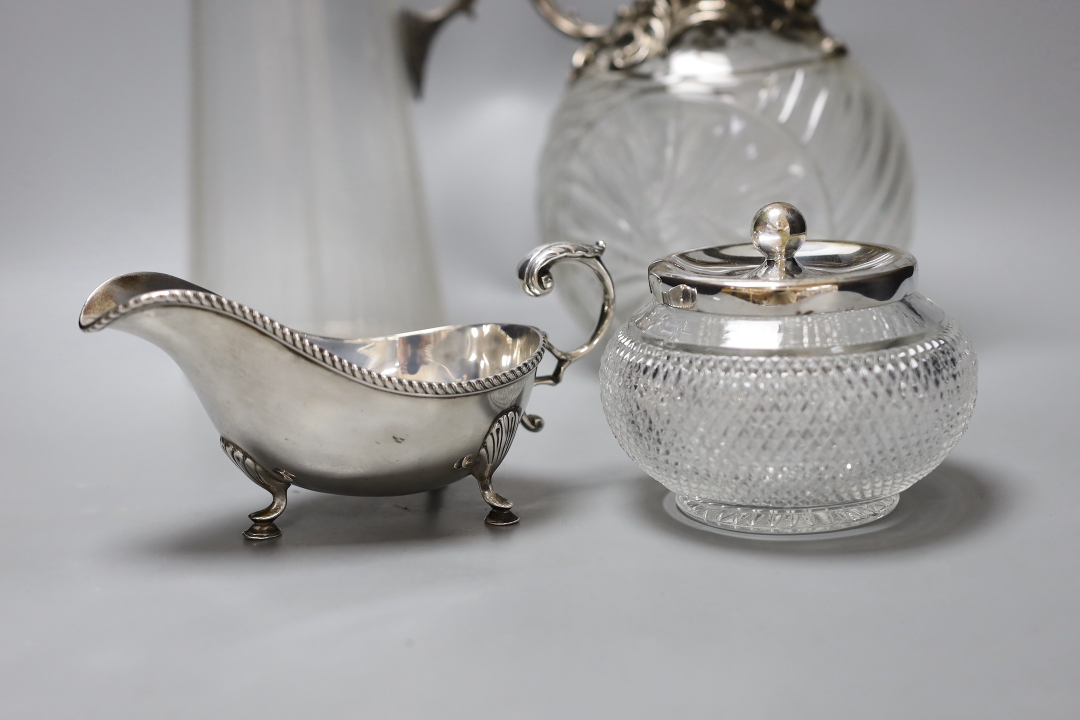 A WMF style plate mounted claret jug and another, a sauce boat sugar bowl compact and mirror (6), Claret jug 29 cms high